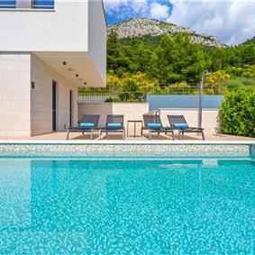 5 bedroom beachfront villa with heated pool near Omis, sleeps 9